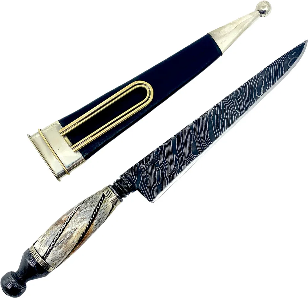 Faca Gaúcha Nordestina Retovada 8" em aço damasco, cabo em osso fossilizado.